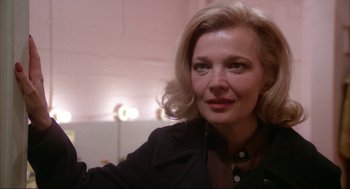 Movie still from “Opening Night” (1977), directed by John Cassavetes – A person with blonde hair; Close Up shot, Over the shoulder angle