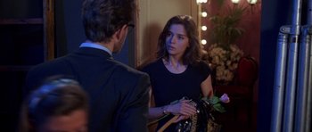 Movie still from “Opera” (1987), directed by Dario Argento – A man and a woman looking at each other; Medium shot, Over the shoulder angle