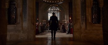 Movie still from “Ophelia” (2018), directed by Claire McCarthy – A group of people standing in front of a window; Extreme Wide shot, Low angle