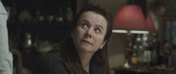 Movie still from “Oranges and Sunshine” (2010), directed by Jim Loach – A person looking up at something; Close Up shot, High angle