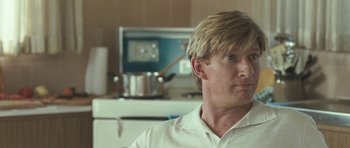 Movie still from “Oranges and Sunshine” (2010), directed by Jim Loach – A person sitting in front of a computer; Close Up shot, Over the shoulder angle
