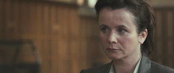 Movie still from “Oranges and Sunshine” (2010), directed by Jim Loach – A person with short hair; Close Up shot, Over the shoulder angle