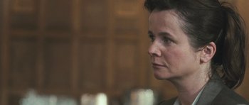Movie still from “Oranges and Sunshine” (2010), directed by Jim Loach – A person looking to her left; Close Up shot, Over the shoulder angle