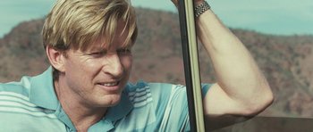 Movie still from “Oranges and Sunshine” (2010), directed by Jim Loach – A person holding a cello; Close Up shot, Low angle