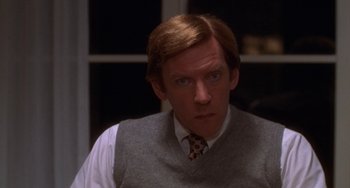 Movie still from “Ordinary People” (1980), directed by Robert Redford – A person wearing a tie; Close Up shot, Over the shoulder angle