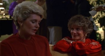 Movie still from “Ordinary People” (1980), directed by Robert Redford – Two women sitting next to each other in a room; Close Up shot, Over the shoulder angle