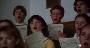 Movie still from “Ordinary People” (1980), directed by Robert Redford – A group of young people singing in a choir; Close Up shot, Low angle