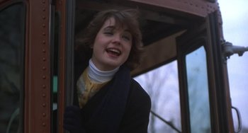 Movie still from “Ordinary People” (1980), directed by Robert Redford – A young woman standing on a train looking out of the window; Close Up shot, Low angle