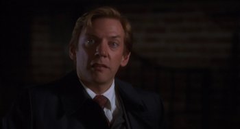 Movie still from “Ordinary People” (1980), directed by Robert Redford – A man in a suit and a tie; Close Up shot, Low angle