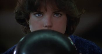 Movie still from “Ordinary People” (1980), directed by Robert Redford – A woman's face looking at the camera; Close Up shot, Low angle