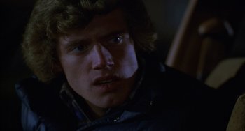 Movie still from “Ordinary People” (1980), directed by Robert Redford – A person wearing a jacket; Close Up shot, Over the shoulder angle
