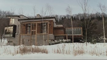 Movie still from “Orphan” (2009), directed by Jaume Collet-Serra – A house in the snow near a forest; Extreme Wide shot, Low angle