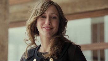 Movie still from “Orphan” (2009), directed by Jaume Collet-Serra – A person with long brown hair; Close Up shot, Over the shoulder angle