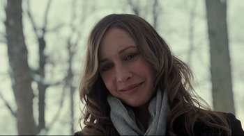 Movie still from “Orphan” (2009), directed by Jaume Collet-Serra – A person wearing a scarf; Close Up shot, Over the shoulder angle