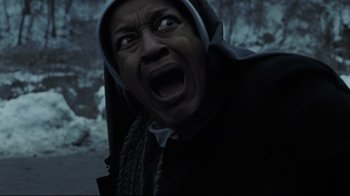 Movie still from “Orphan” (2009), directed by Jaume Collet-Serra – A man in a hooded jacket is screaming; Close Up shot, Low angle