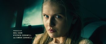 Movie still from “Our Kind of Traitor” (2016), directed by Susanna White – A person with blue eyes; Close Up shot, Low angle