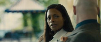 Movie still from “Our Kind of Traitor” (2016), directed by Susanna White – A person with long hair; Close Up shot, Over the shoulder angle