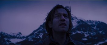 Movie still from “Our Kind of Traitor” (2016), directed by Susanna White – A person looking up at the sky; Close Up shot, Low angle