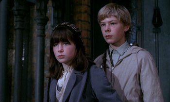 Movie still from “Our Mother's House” (1967), directed by Jack Clayton – A boy and a girl standing next to each other; Close Up shot, Low angle