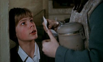Movie still from “Our Mother's House” (1967), directed by Jack Clayton – A young boy looking up at an older person; Close Up shot, Over the shoulder angle