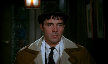 Movie still from “Our Mother's House” (1967), directed by Jack Clayton – A person wearing a hat and a coat; Close Up shot, High angle