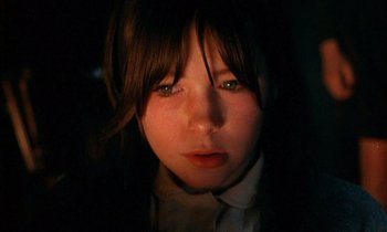 Movie still from “Our Mother's House” (1967), directed by Jack Clayton – A young girl is looking into the camera; Close Up shot, High angle