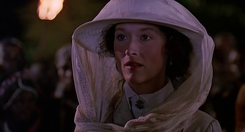 Movie still from “Out of Africa” (1985), directed by Sydney Pollack – A person wearing a hat; Close Up shot, Low angle