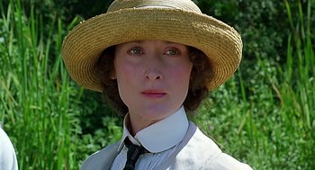 Movie still from “Out of Africa” (1985), directed by Sydney Pollack – A person wearing a hat; Close Up shot, Low angle