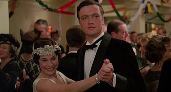 Movie still from “Out of Africa” (1985), directed by Sydney Pollack – A man and a woman are dancing in formal wear; Close Up shot, Low angle