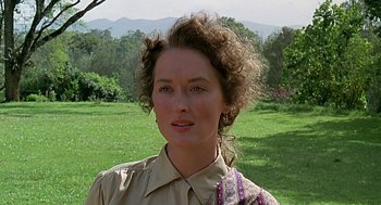 Movie still from “Out of Africa” (1985), directed by Sydney Pollack – A person wearing a shirt; Close Up shot, Over the shoulder angle