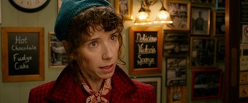 Movie still from “Paddington” (2014), directed by Paul King – A woman in a red coat and a blue hat; Close Up shot, Over the shoulder angle