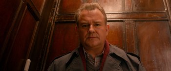 Movie still from “Paddington” (2014), directed by Paul King – A person wearing a jacket; Close Up shot, Low angle