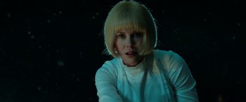 Movie still from “Paddington” (2014), directed by Paul King – A woman with blonde hair is posing for a picture; Close Up shot, Low angle