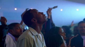 Movie still from “Paid in Full” (2002), directed by Charles Stone III – A group of young people standing in front of a microphone; Close Up shot, Low angle
