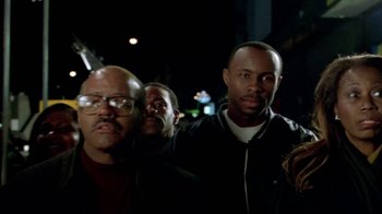 Movie still from “Paid in Full” (2002), directed by Charles Stone III – A group of men standing next to each other in the dark; Close Up shot, Low angle