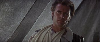 Movie still from “Paint Your Wagon” (1969), directed by Joshua Logan – A person wearing a robe; Close Up shot, Low angle