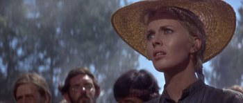 Movie still from “Paint Your Wagon” (1969), directed by Joshua Logan – A person wearing a straw hat; Close Up shot, Low angle
