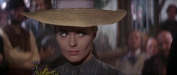 Movie still from “Paint Your Wagon” (1969), directed by Joshua Logan – A person wearing a hat; Close Up shot, Over the shoulder angle