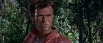 Movie still from “Paint Your Wagon” (1969), directed by Joshua Logan – A person wearing a red shirt; Close Up shot, Low angle
