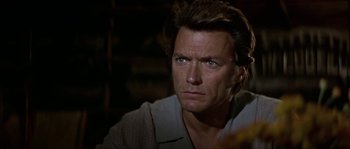 Movie still from “Paint Your Wagon” (1969), directed by Joshua Logan – A person with long brown hair; Close Up shot, Over the shoulder angle