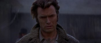 Movie still from “Paint Your Wagon” (1969), directed by Joshua Logan – A person wearing a jacket; Close Up shot, Low angle