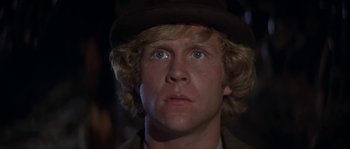 Movie still from “Paint Your Wagon” (1969), directed by Joshua Logan – A person wearing a hat; Close Up shot, Low angle