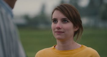 Movie still from “Palo Alto” (2013), directed by Gia Coppola – A person wearing a yellow shirt; Close Up shot, Over the shoulder angle