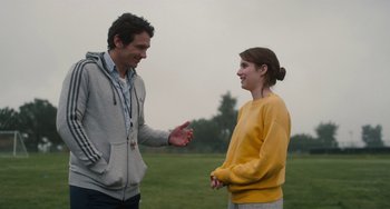 Movie still from “Palo Alto” (2013), directed by Gia Coppola – A man and a woman talking to each other outside; Medium shot, Over the shoulder angle