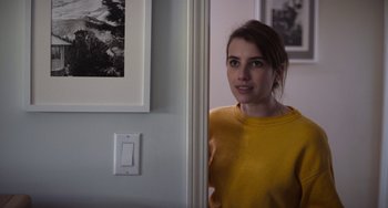 Movie still from “Palo Alto” (2013), directed by Gia Coppola – A woman in a yellow shirt standing in a room; Close Up shot, Over the shoulder angle