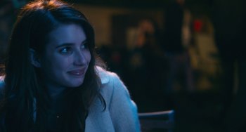 Movie still from “Palo Alto” (2013), directed by Gia Coppola – A beautiful young lady sitting at a table in a restaurant; Close Up shot, Over the shoulder angle