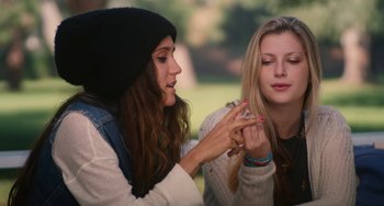 Movie still from “Palo Alto” (2013), directed by Gia Coppola – Two young women are looking at each other's nails; Close Up shot, Low angle