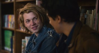 Movie still from “Palo Alto” (2013), directed by Gia Coppola – Two young people are talking to each other in a room; Close Up shot, Over the shoulder angle