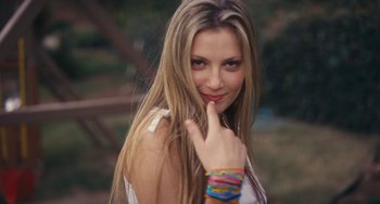 Movie still from “Palo Alto” (2013), directed by Gia Coppola – A beautiful young lady with long blonde hair; Close Up shot, Low angle