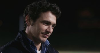 Movie still from “Palo Alto” (2013), directed by Gia Coppola – A person wearing a jacket; Close Up shot, Over the shoulder angle